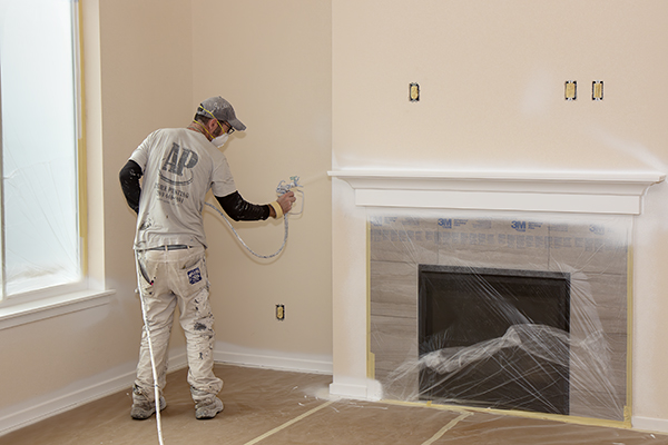 fireplace mantle being painted